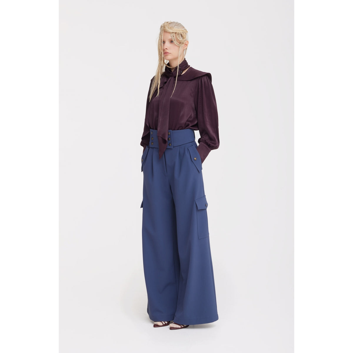 JULIA ALLERT burgundy high-neck blouse styled with blue wide-leg jeans, buy at DOORS NYC