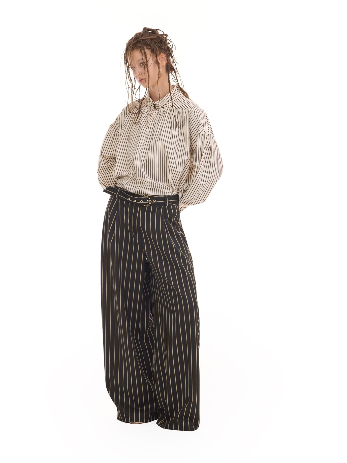 JULIA ALLERT black pinstripe wide-leg trousers, side view on model, buy at DOORS NYC