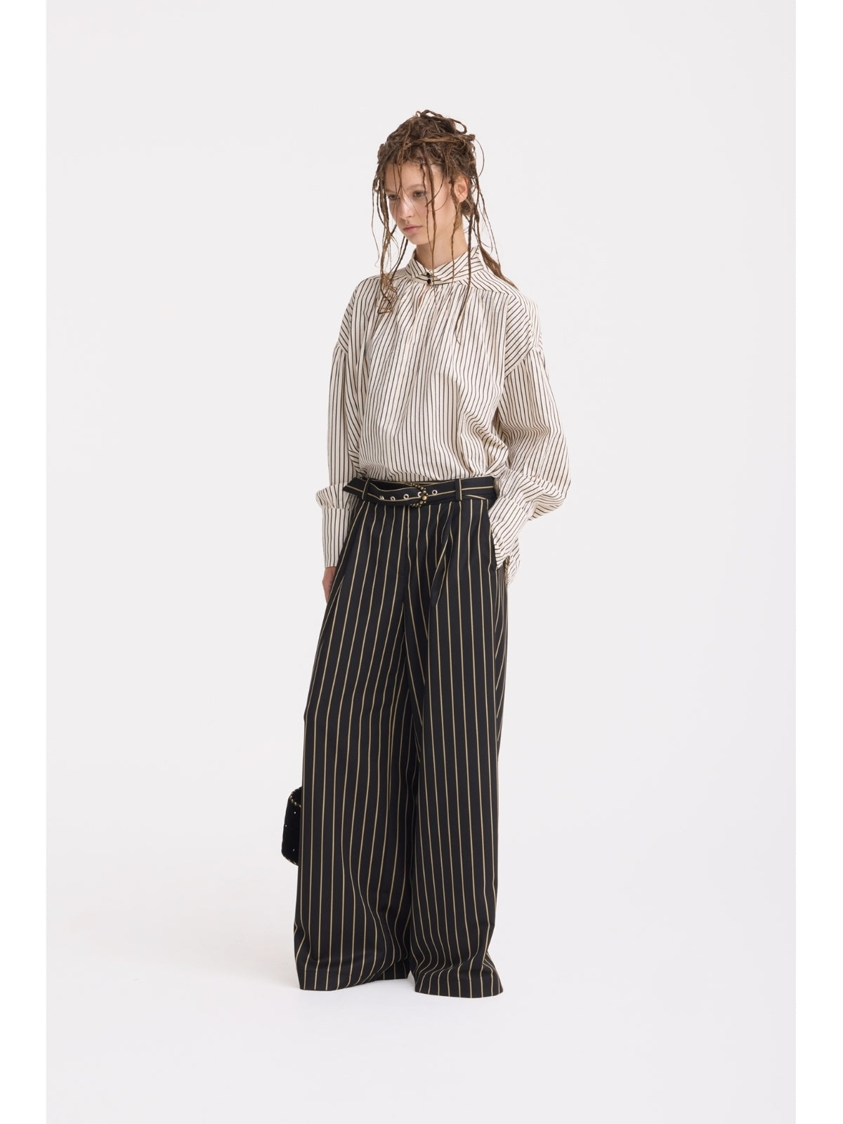 JULIA ALLERT black pinstripe palazzo trousers worn by model with striped blouse, styled look, buy at DOORS NYC