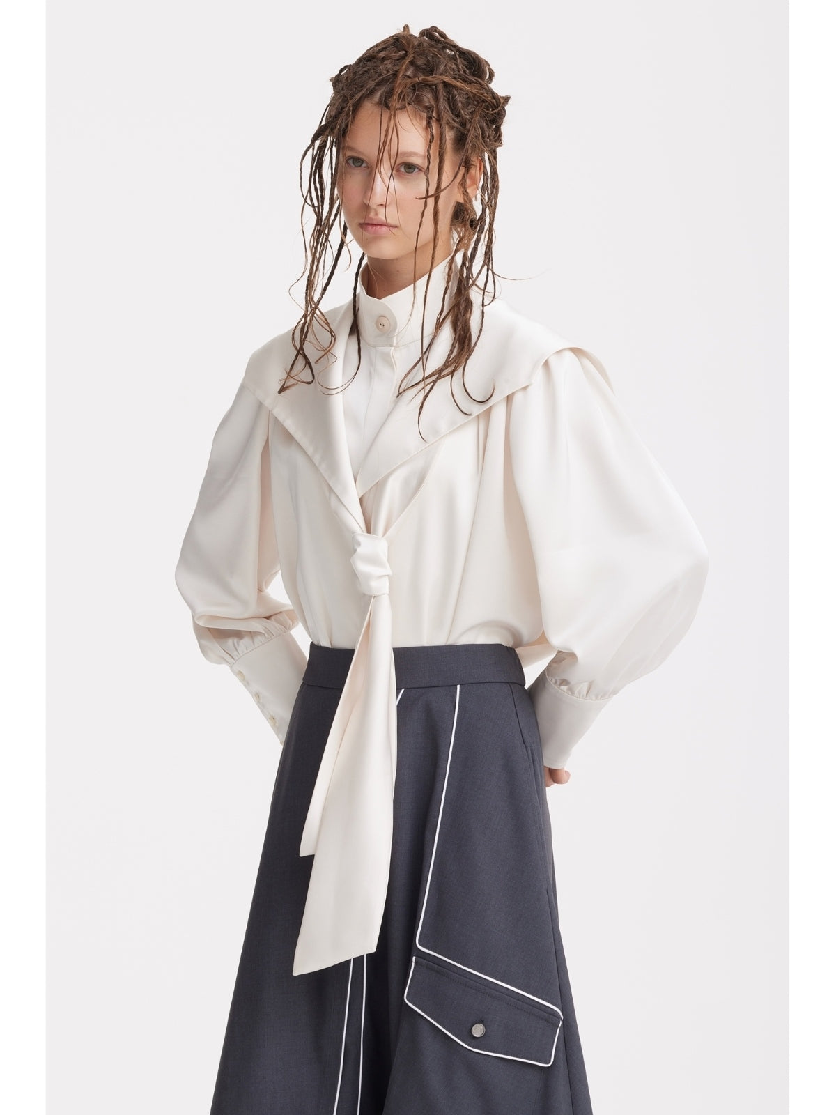 JULIA ALLERT dark gray asymmetrical midi skirt worn by model with white blouse, styled look, buy at DOORS NYC