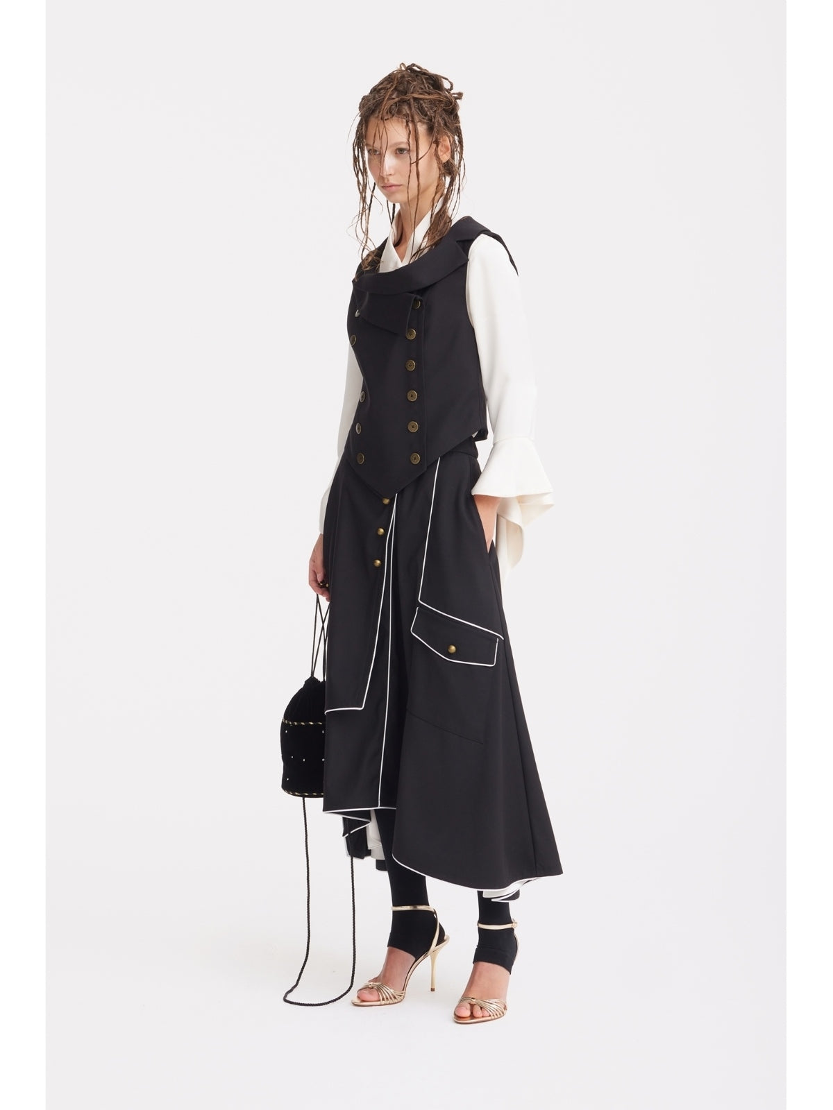 JULIA ALLERT black asymmetrical skirt, styled with vest, buy at DOORS NYC