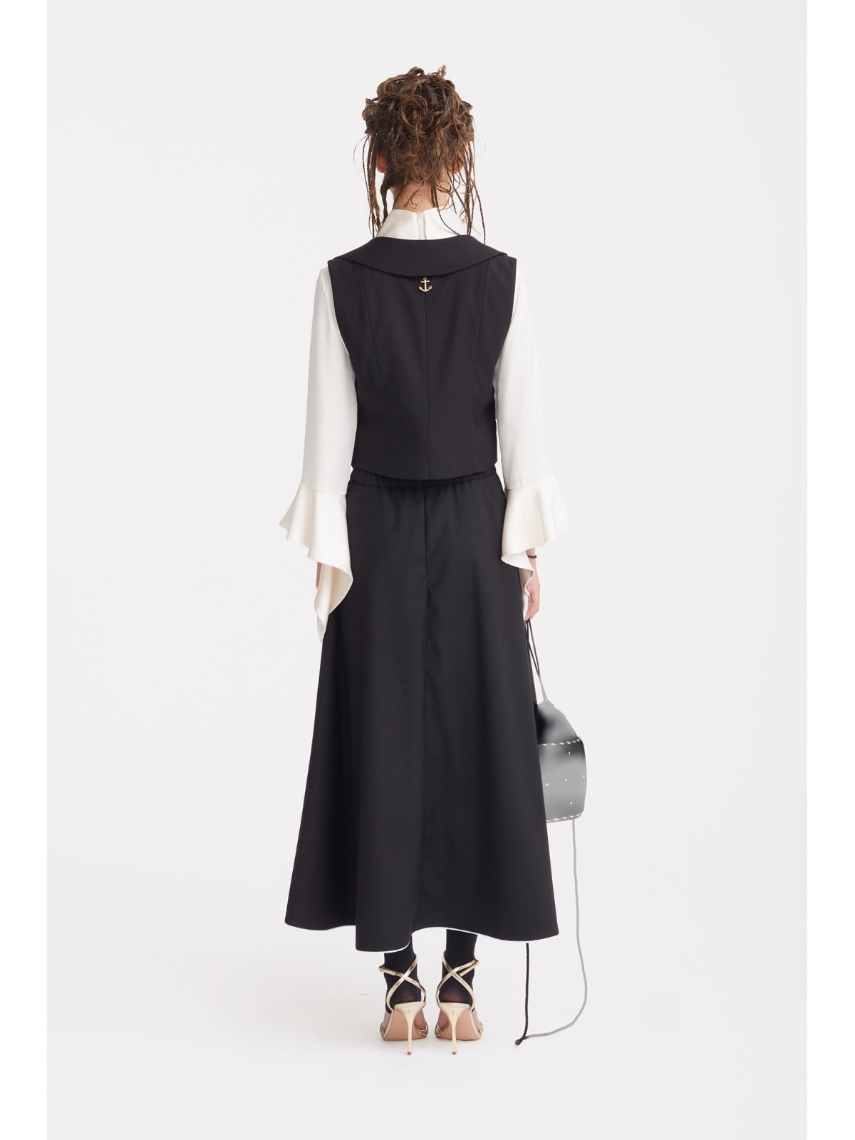 JULIA ALLERT black tailored midi skirt, back view on model, buy at DOORS NYC