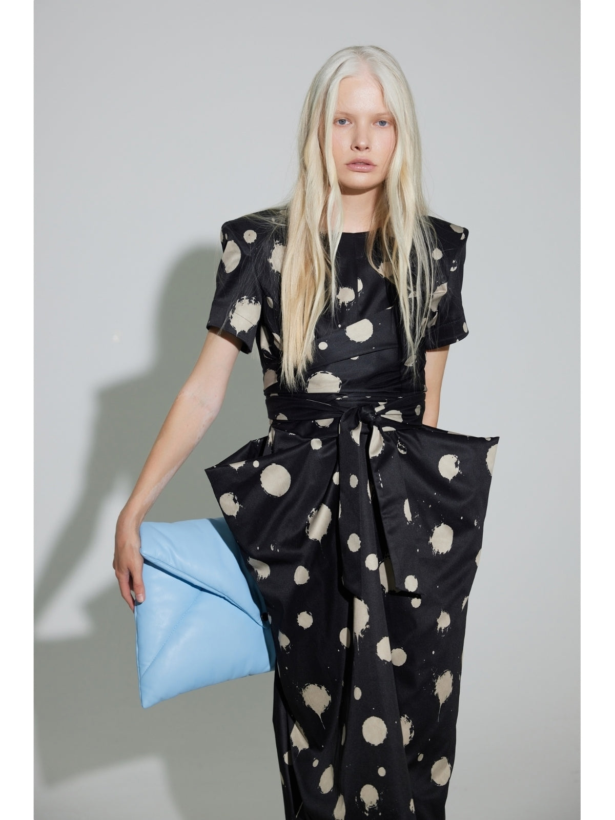 JULIA ALLERT black polka dot midi dress, side view on model, buy at DOORS NYC