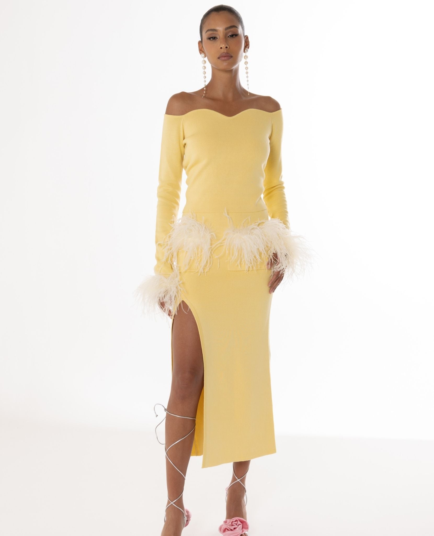 ANDREEVA - Butter Yellow Vanilla Knit Top With Detachable Feathers Cuffs
, buy at DOORS NYC
