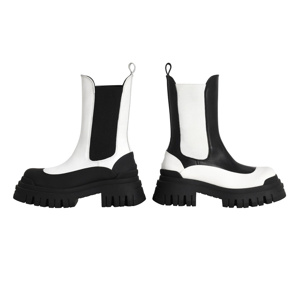 Black and white chunky sole boots on a white background