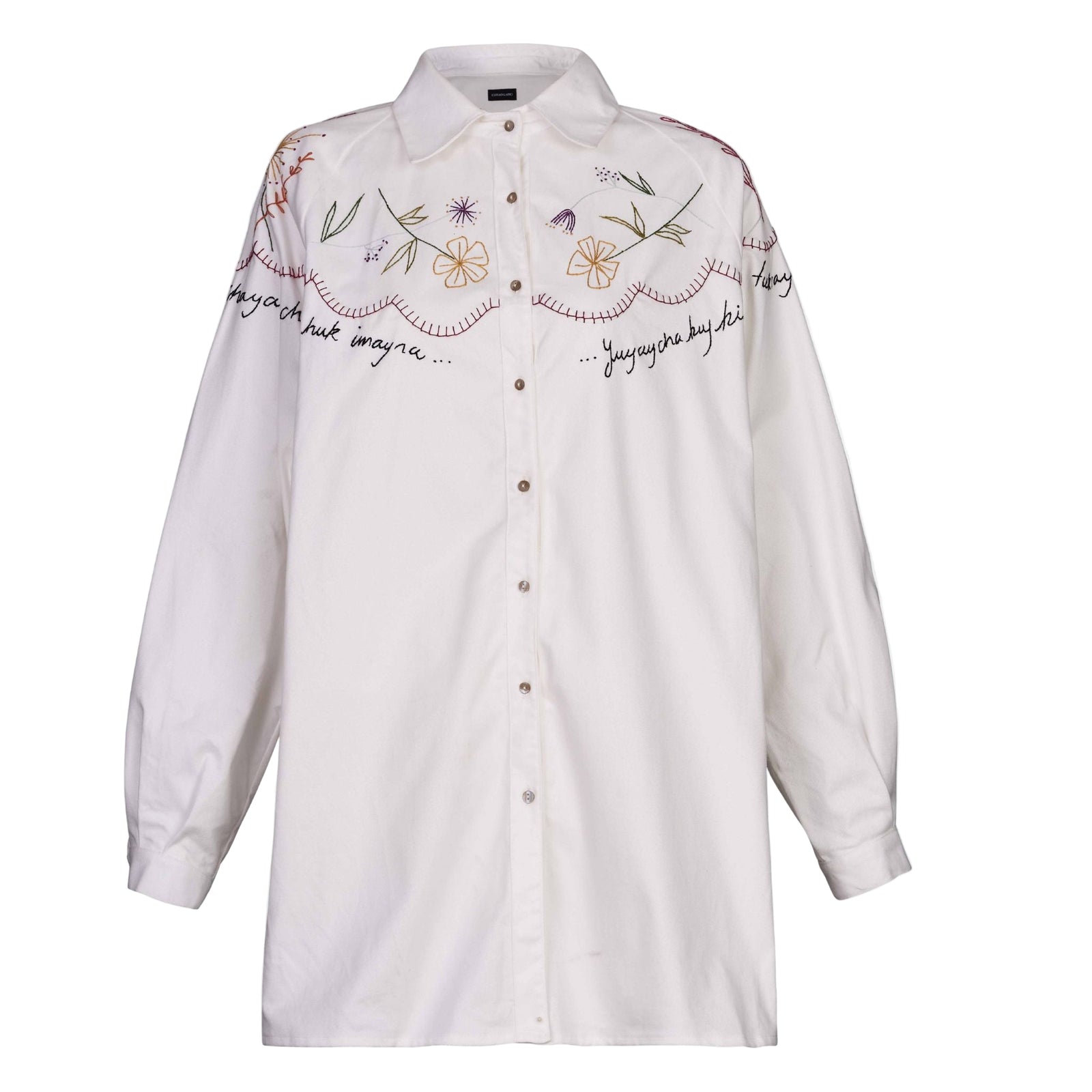 White shirt with floral embroidery and text on a white background
