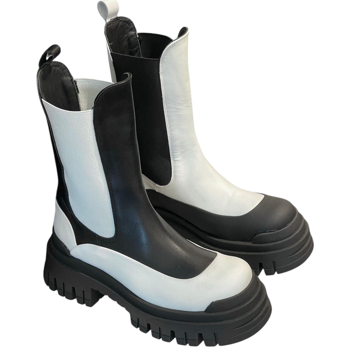 Black and white rubber boots on a white background