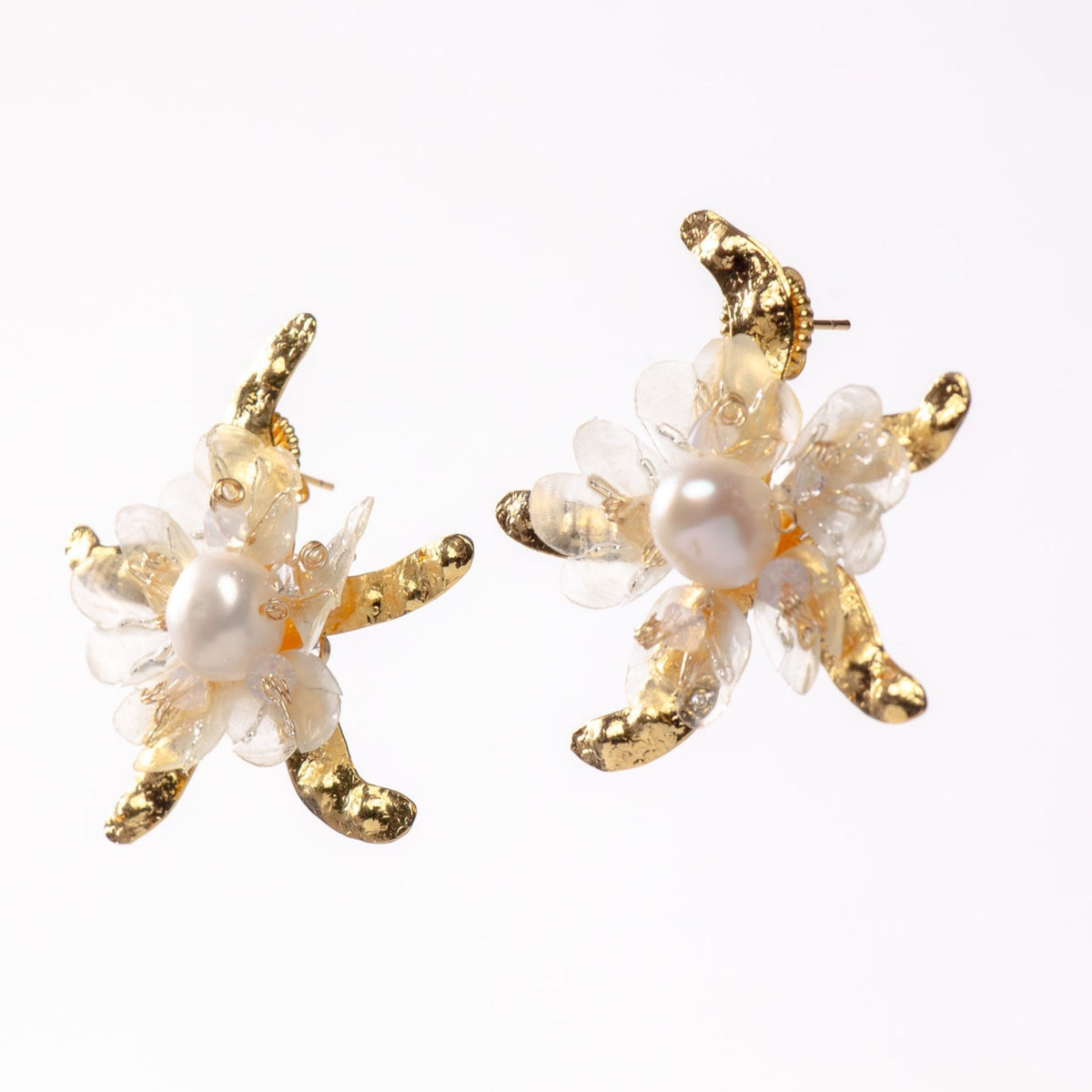 Starfish earring laying flat design by Alma Dos Mares