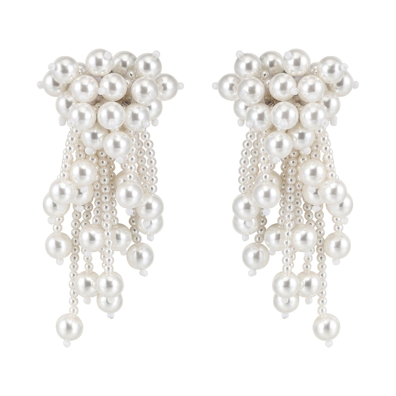 Pair of pearl earrings with dangling beads on a white background