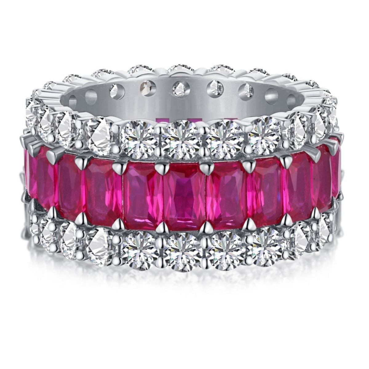 Ring with pink gemstones and diamonds on a white background