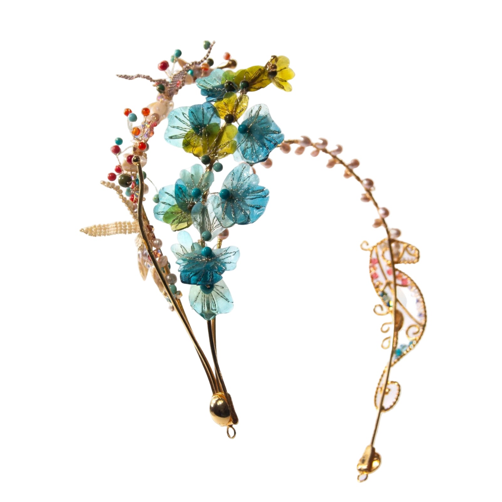Gold plated tiara inspired in a seahorse floating dancing in a coral reef design by Alma Dos Mares