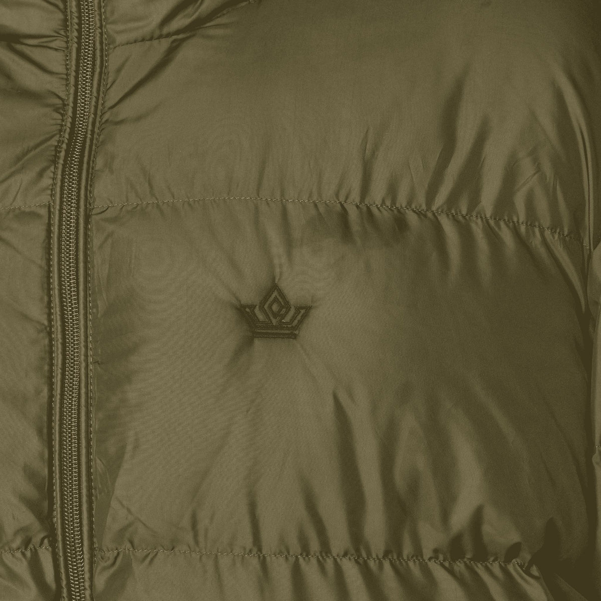 Close-up of lined hood with elastic cords and plastic stoppers on khaki black puffe