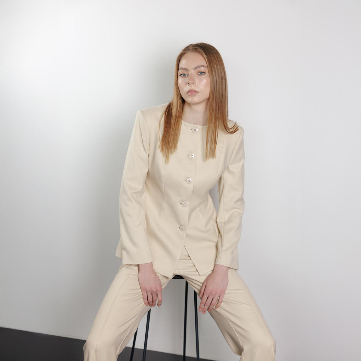 Sculpted Peplum-Hem Collarless Beige Jacket