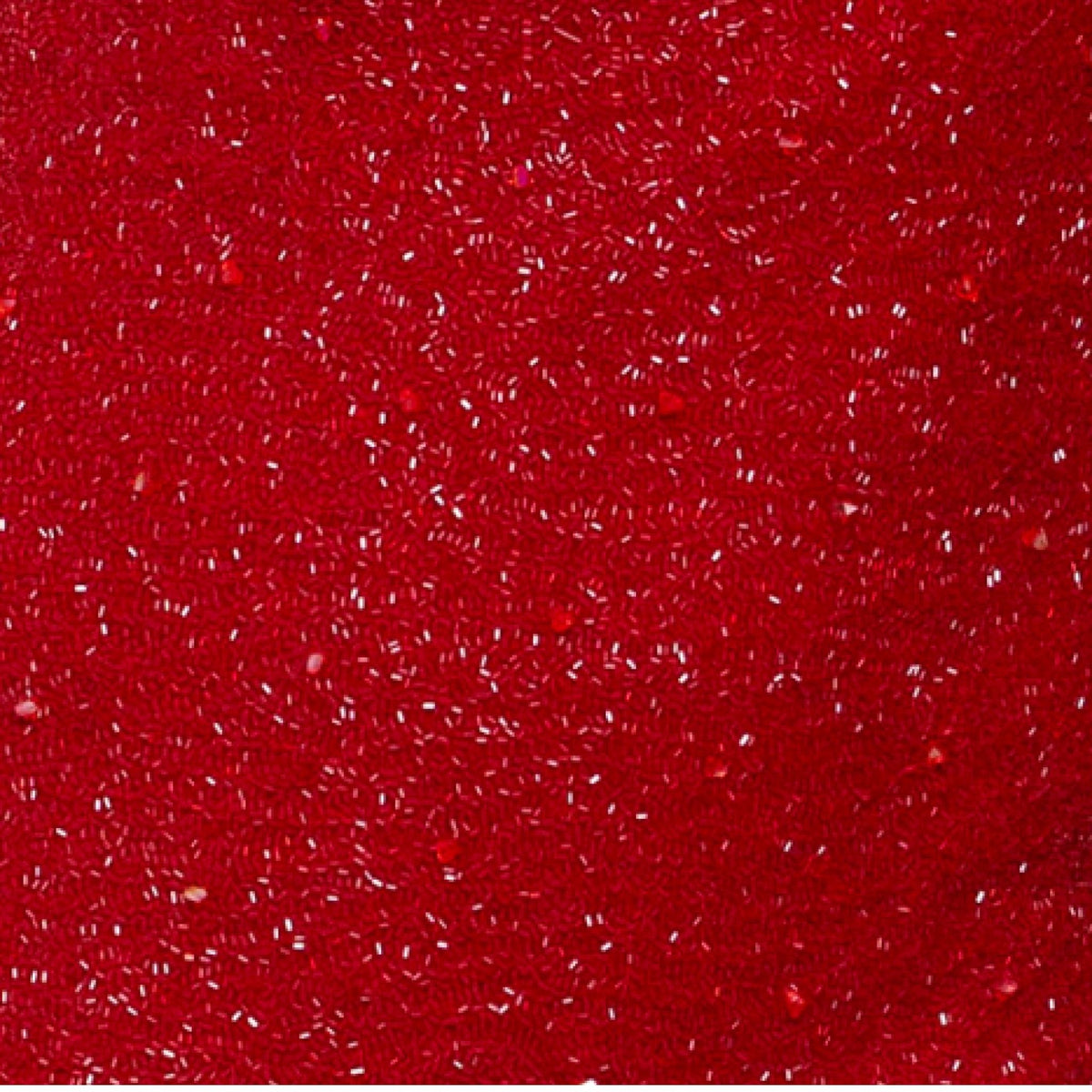 Close-up of the SELF-ADORE Ruby Hand-Beaded Embellished Mini Dress, its red surface glistening with sparkling droplets for a textured look reminiscent of intricate beading.