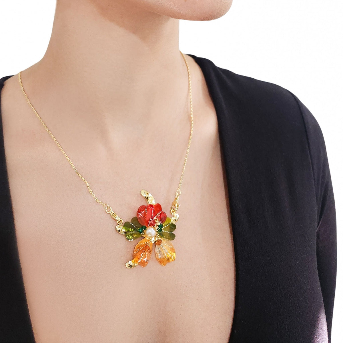 Model chest wearing neckalace in close up