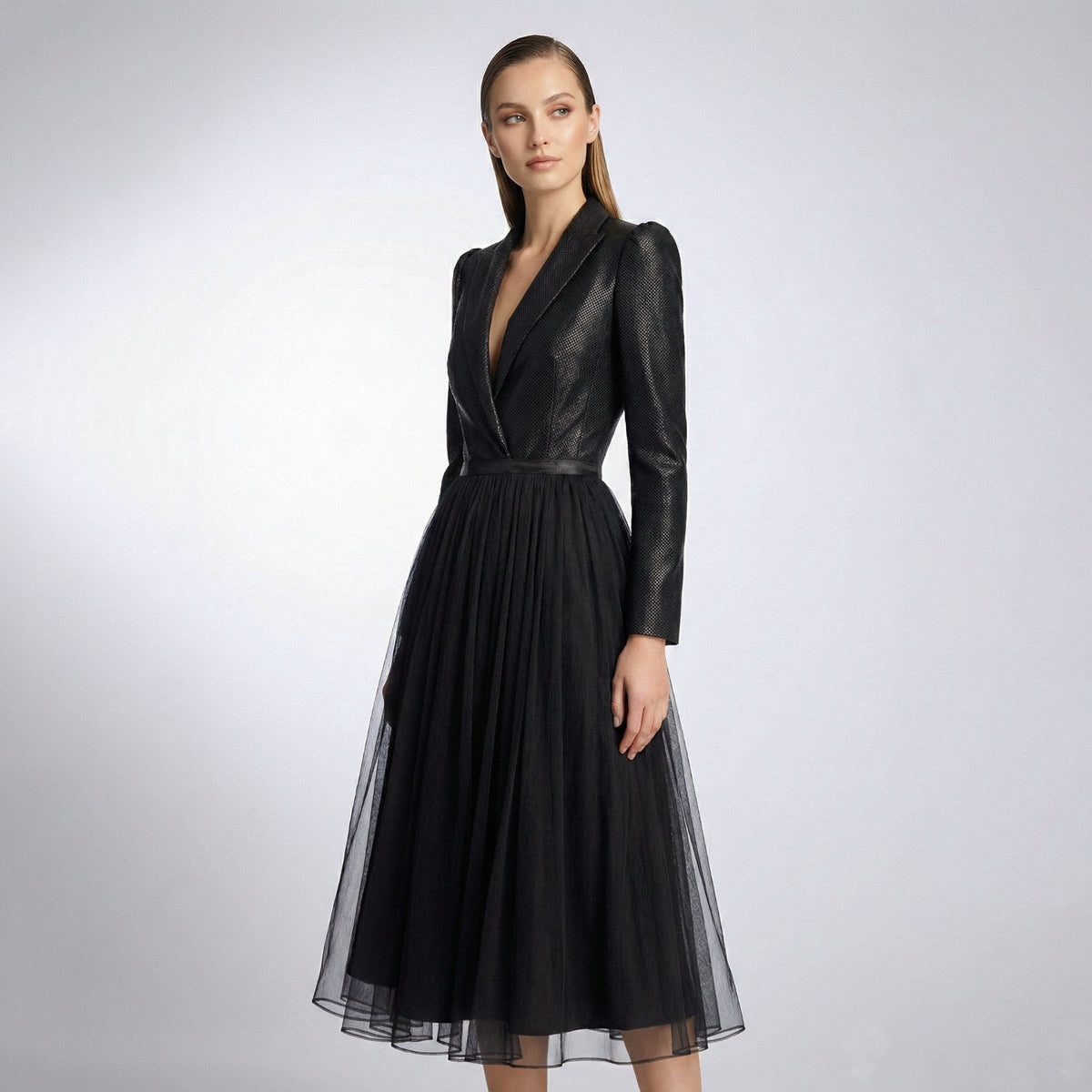 Black dress with long sleeves on a white background