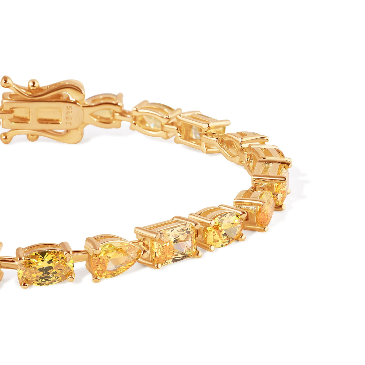Gold bracelet with yellow gemstones on a white background