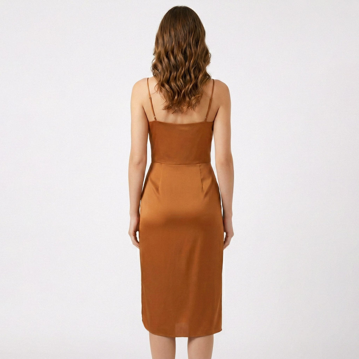 Brown dress with thin straps on a white background