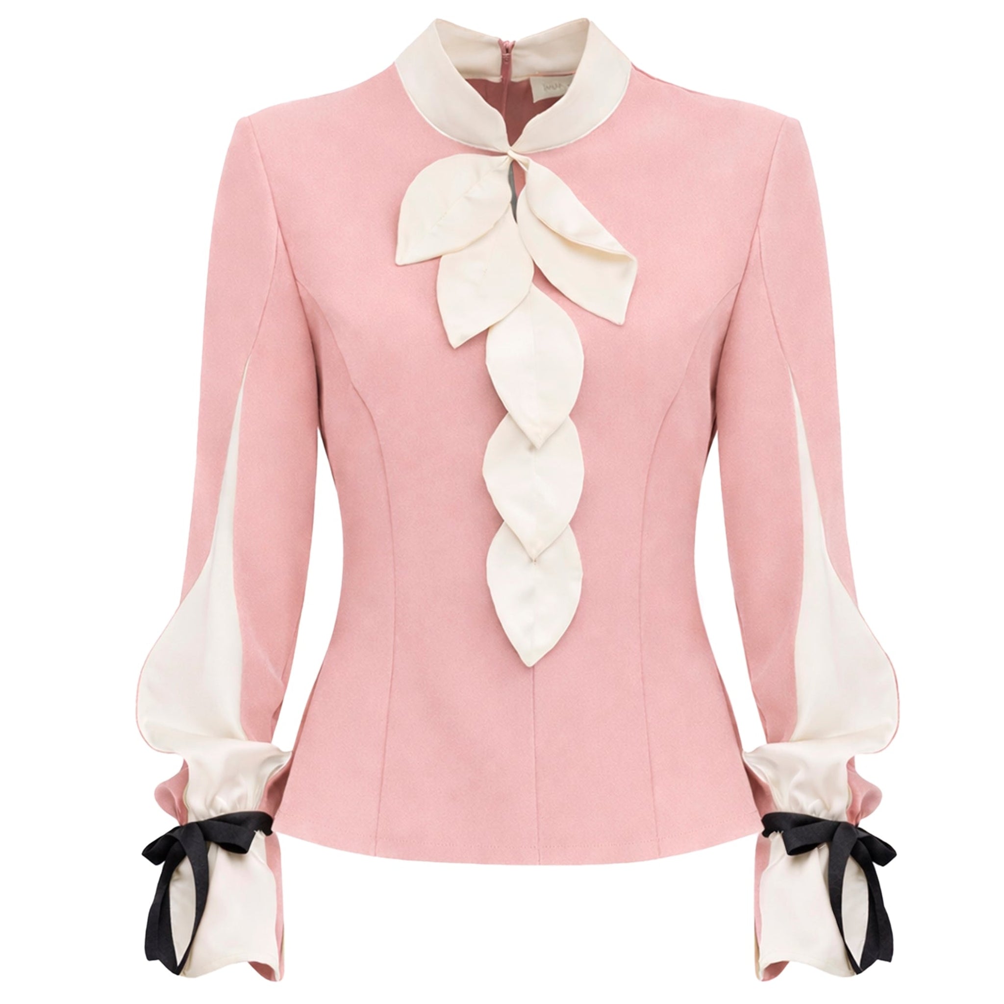 The Elegant Fitted Blouse - Pale Pink by JULIA ALLERT features long sleeves, white leaf-shaped accents, black ribbon bows at the wrists, a high collar, and is crafted from luxury suiting fabric for a feminine, vintage-inspired look.