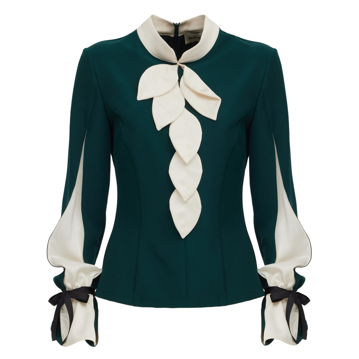 The Elegant Fitted Blouse - Emerald by JULIA ALLERT is crafted from luxury suiting fabric, featuring cream leaf-shaped front accents, cream sleeve panels, and black ribbon bows at the cuffs.