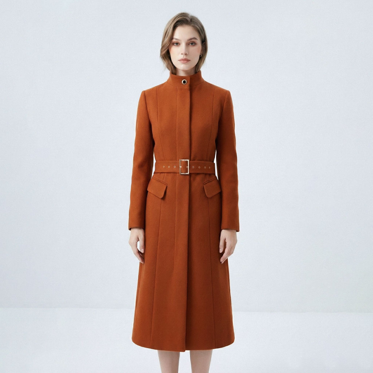 Brown coat with a belt on a white background