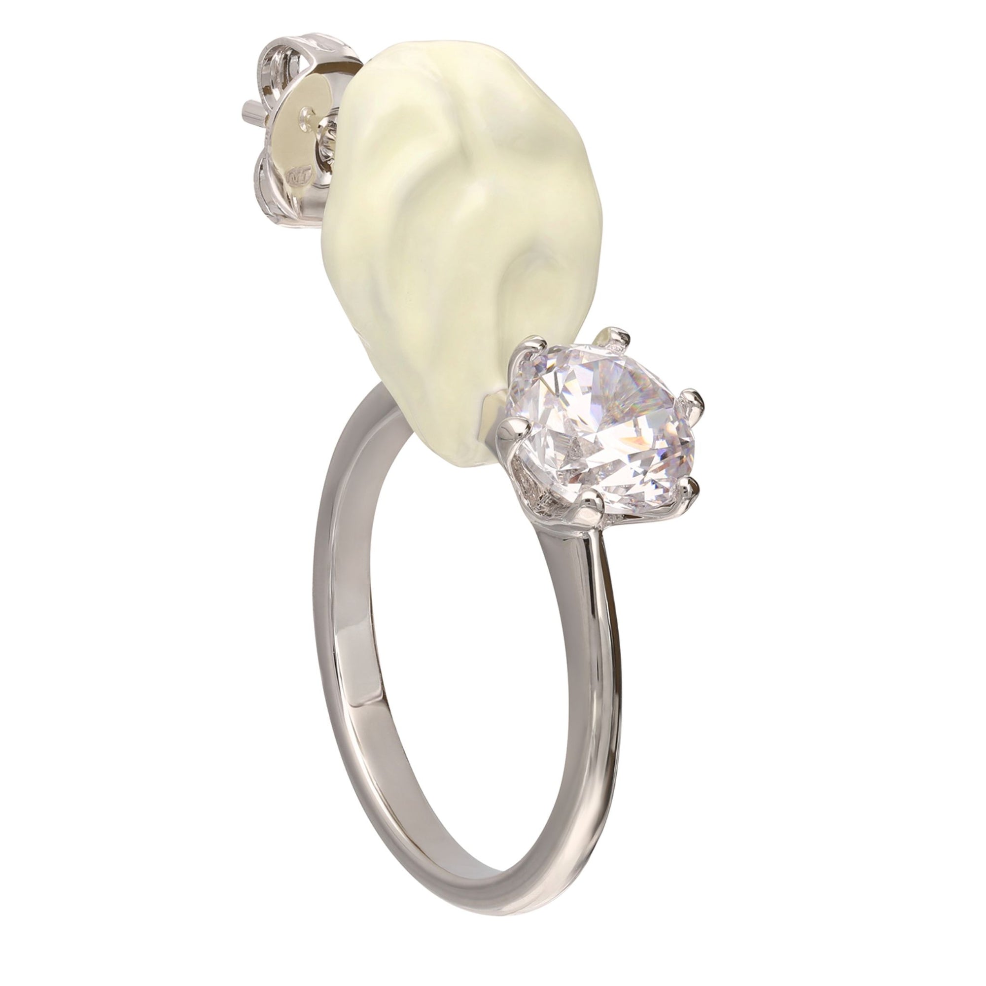 Ring with a large pearl and smaller diamond on a white background