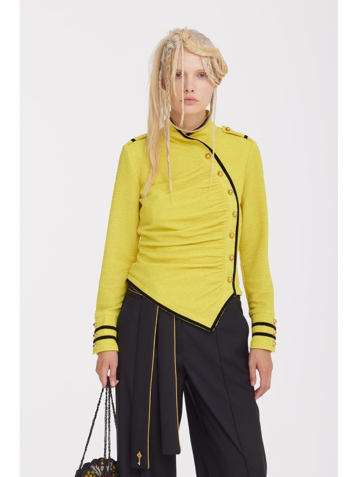 JULIA ALLERT yellow ruched asymmetrical blouse worn by model with black trousers, styled look, buy at DOORS NYC