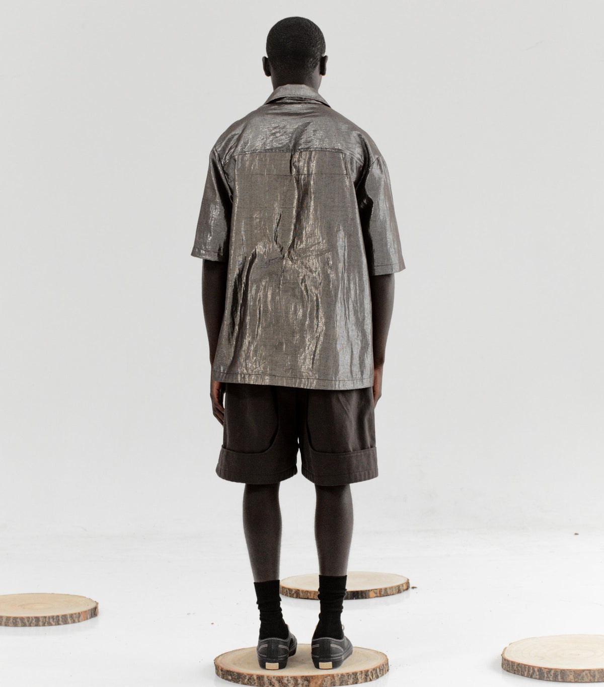 CLARA SON - Oversized Shorts with Bibs Detail | Espresso  , buy at DOORS NYC