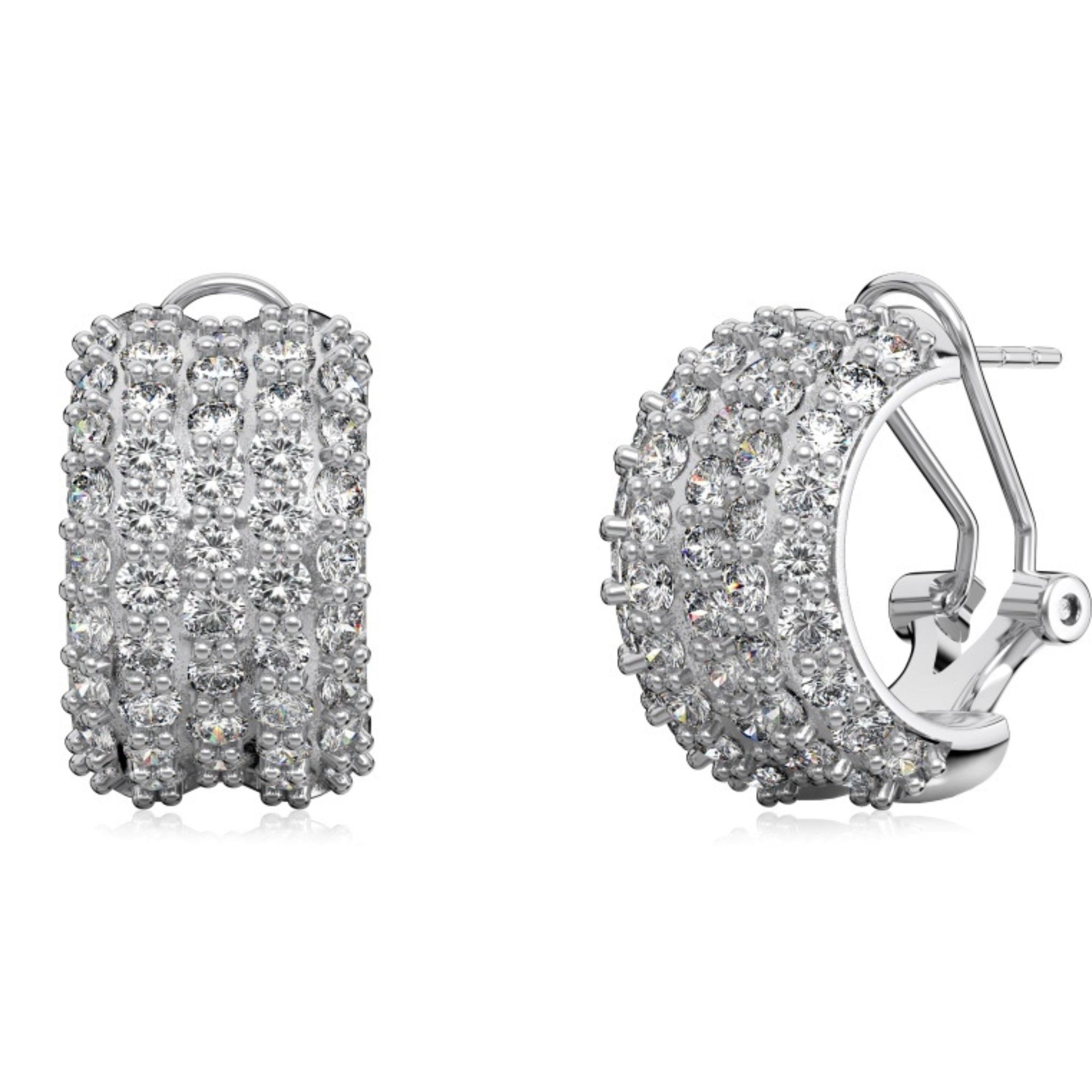 Silver hoop earrings with clear gemstones on a white background