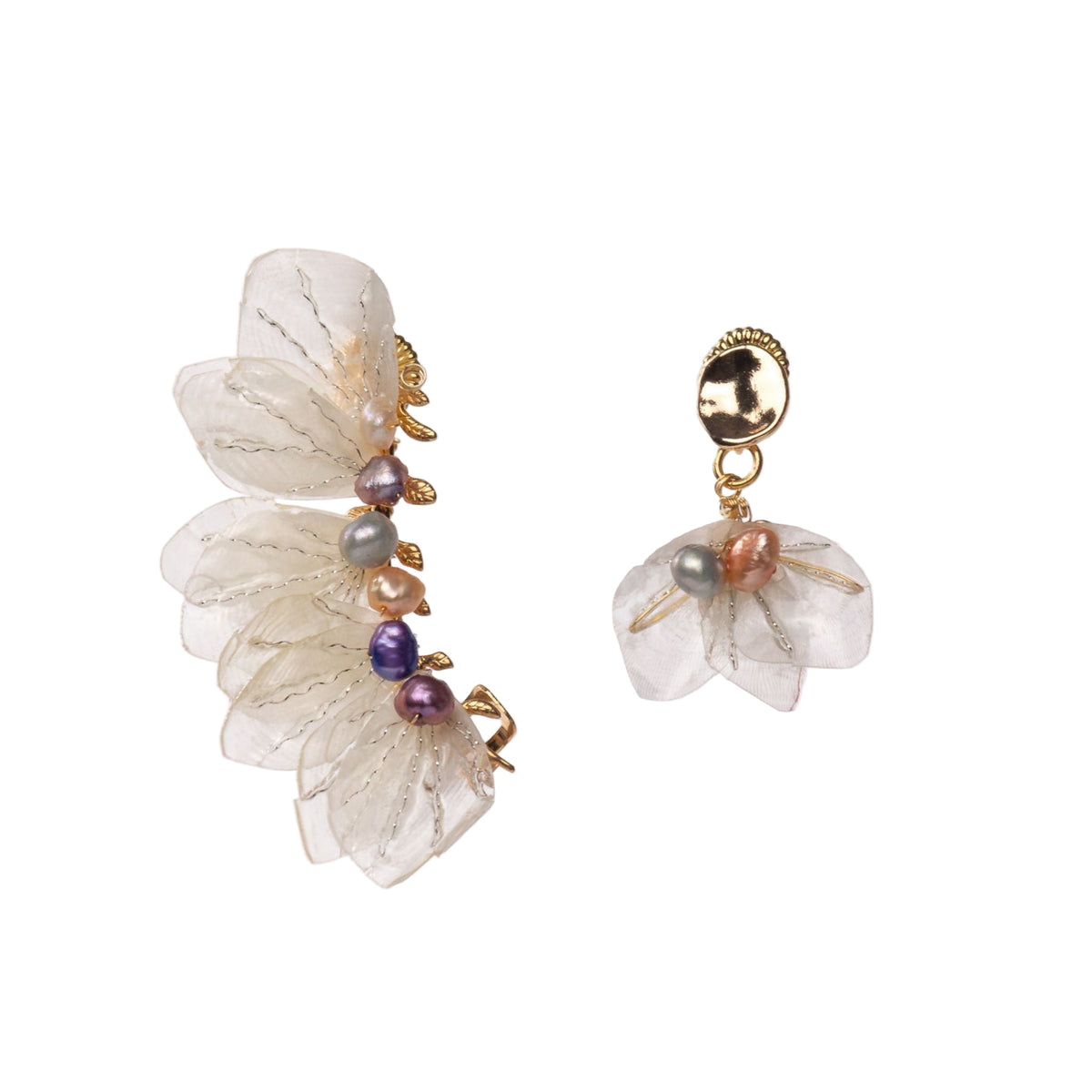 Sealilly earcuff designed by Alma Dos Mares both ears are different.