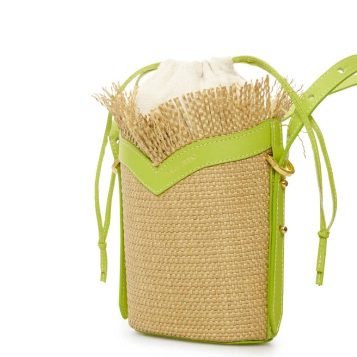 Woven handbag with green accents on a white background