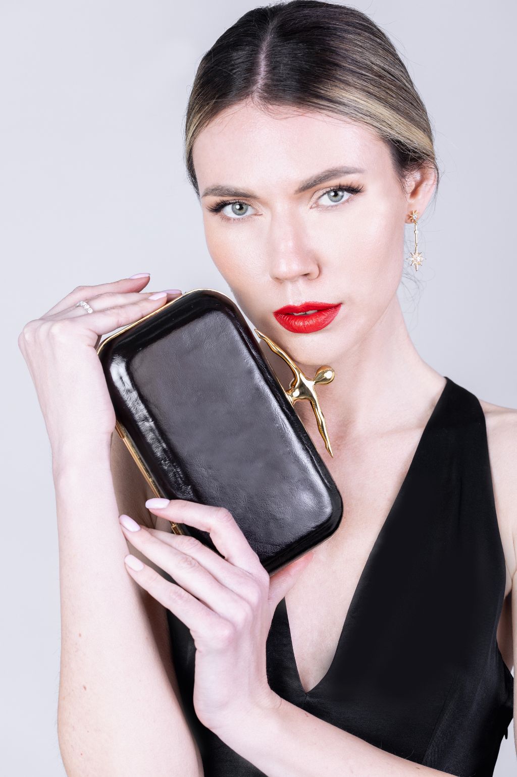 VINT-I-VUIT - Leather Clutch buy at DOORS NYC