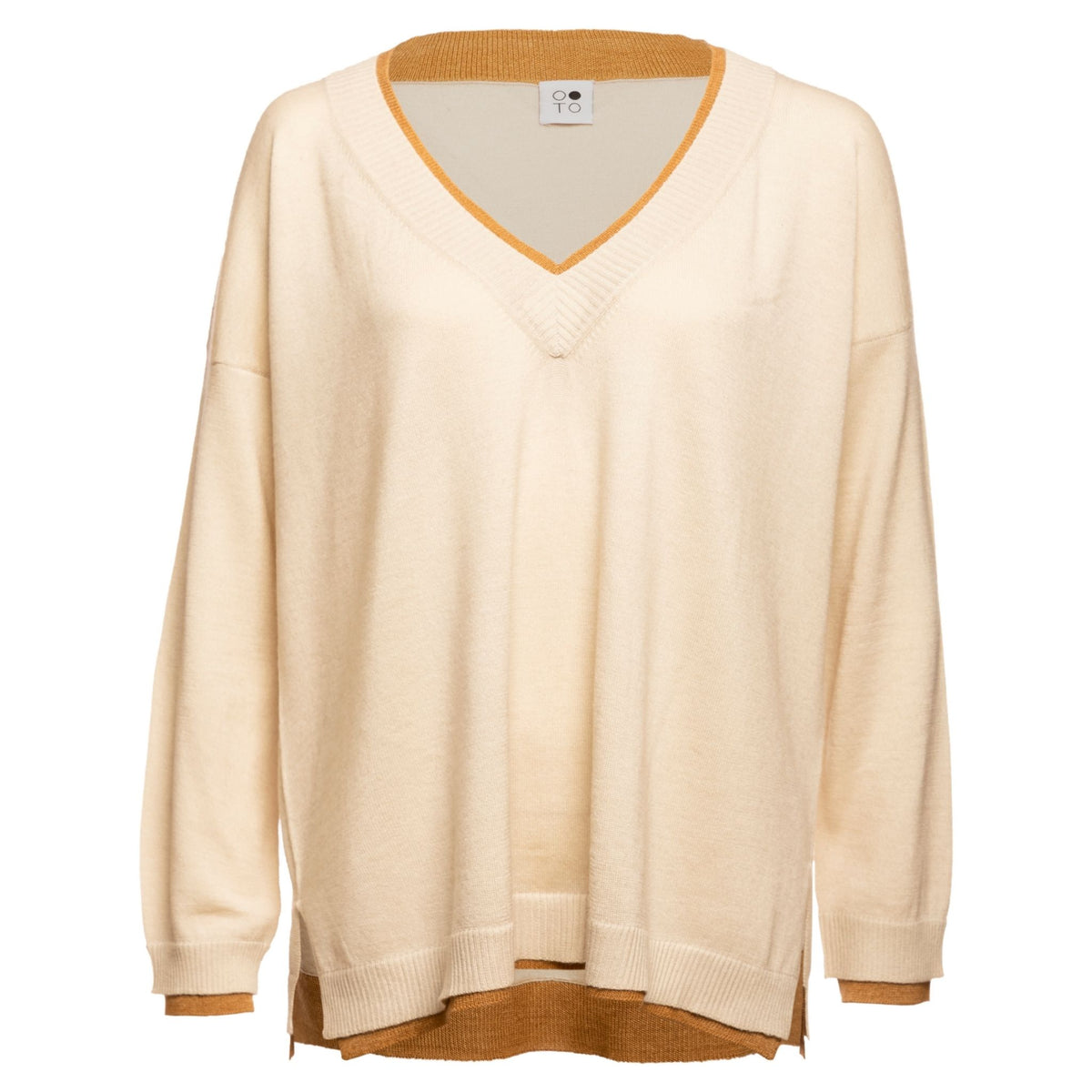 The OO-TO White with Beige Lapis Oversized V-Neck Sweater features a loose fit and contrasting beige trim at the neckline, hem, and cuffs, with visible layered beige underlayers for extra style.