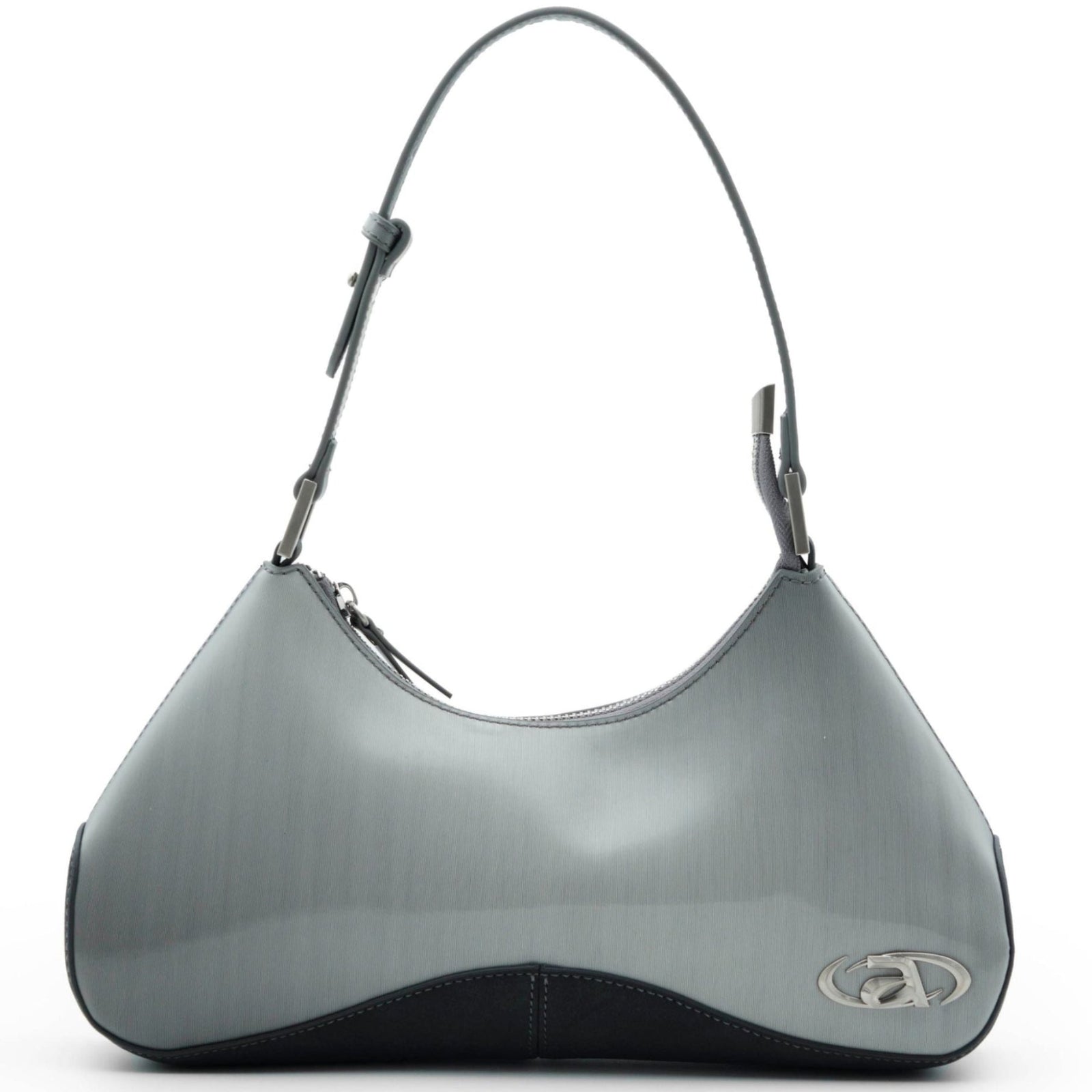 Close-up of Ada crossbody bag with signature metal logo and top zip closure