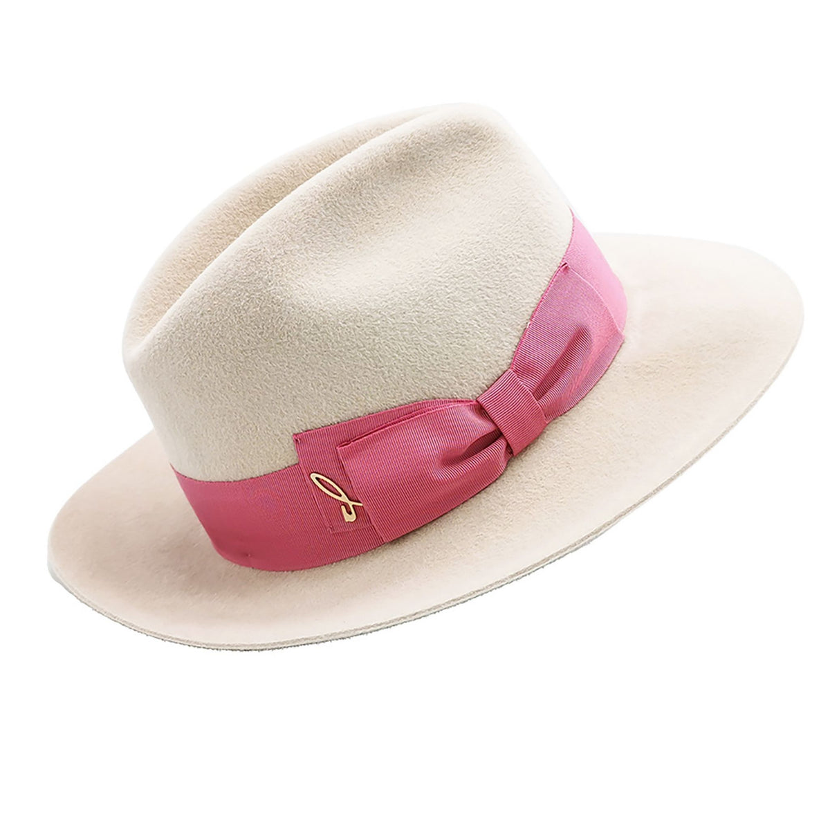 Beige hat with a pink band and bow on a white background