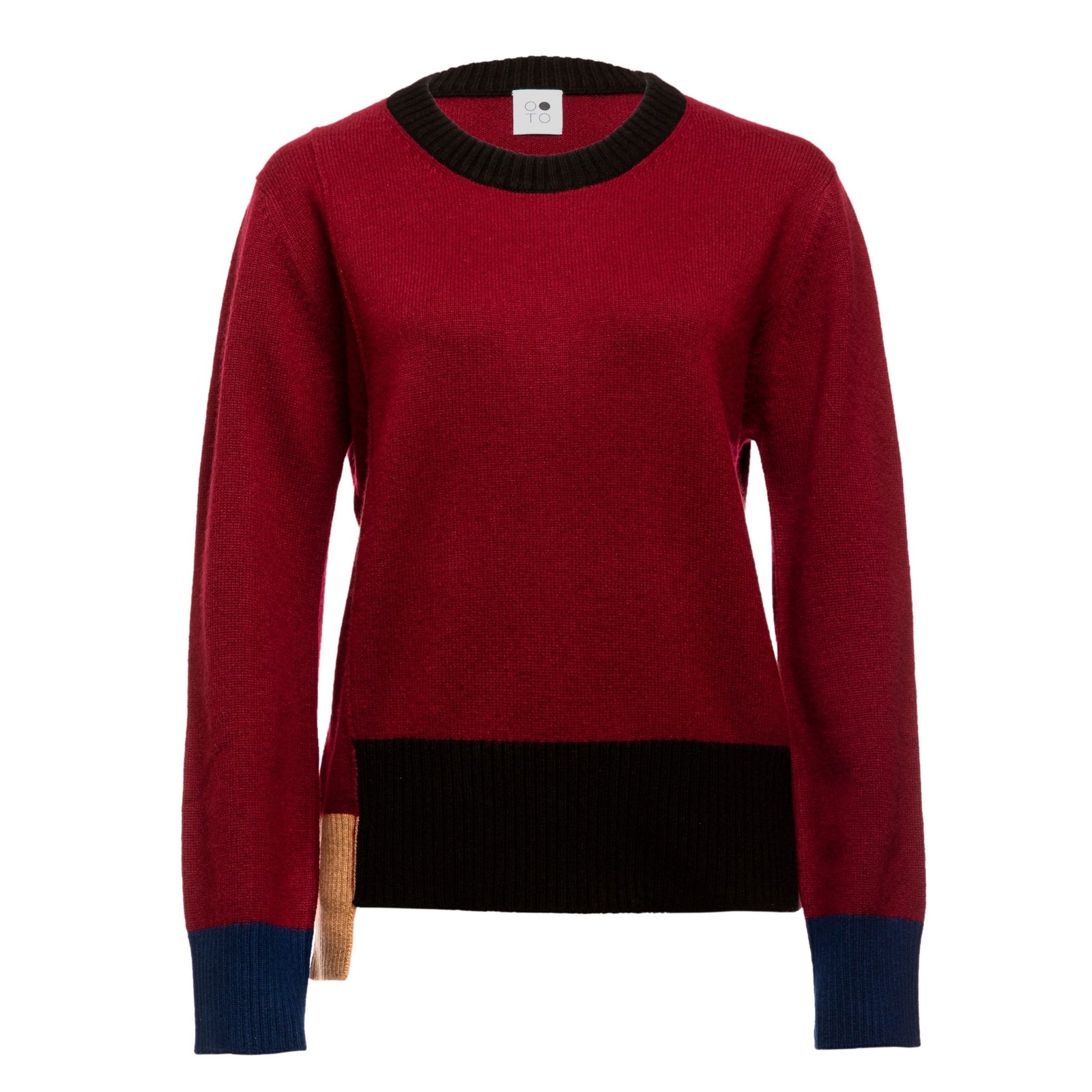 The OO-TO Multi-tone Wine Onyx Crew Neck Sweater features avant-garde knit cashmere with a red body, black ribbed collar and hem, blue cuffs, and a small tan accent on one side of the hem.