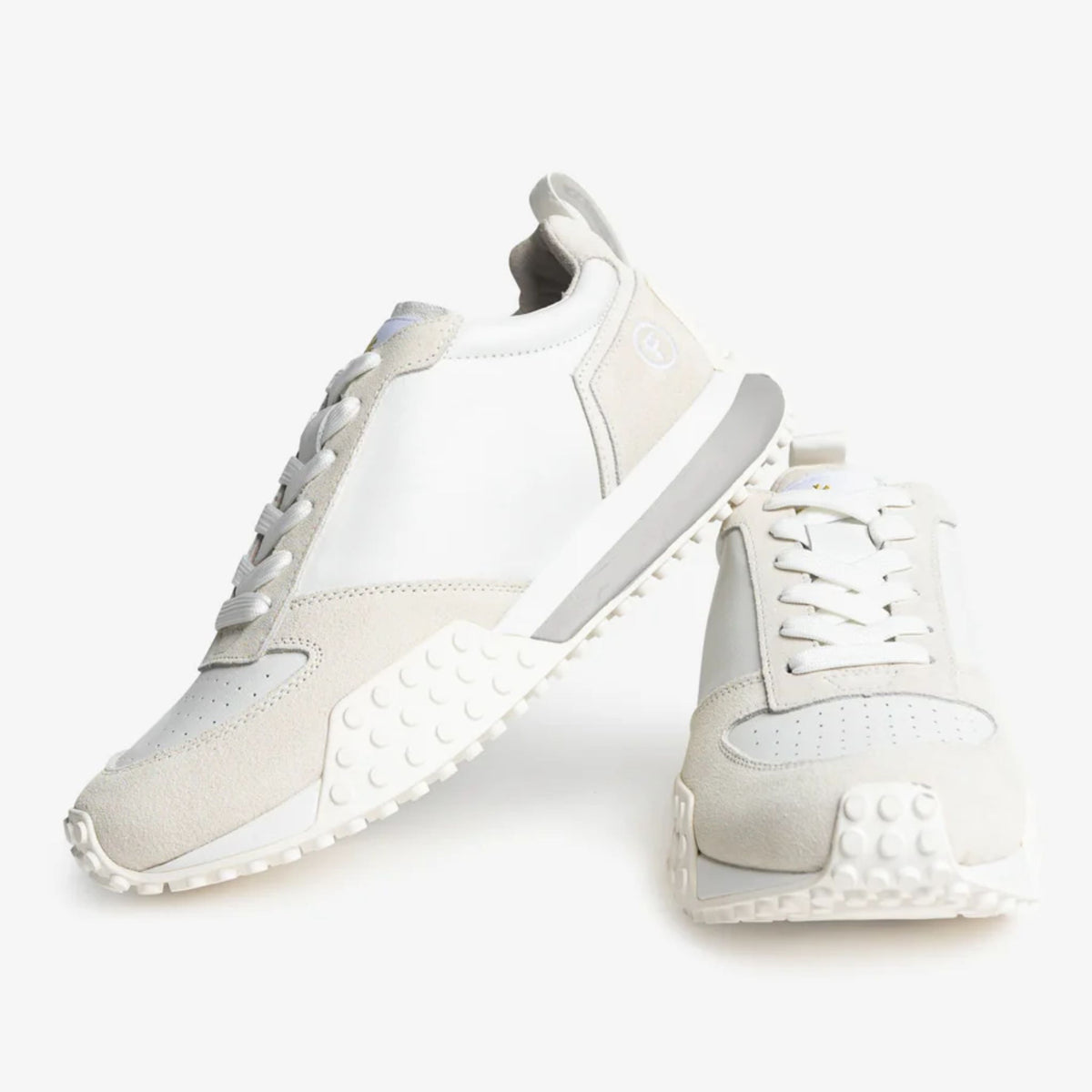 White sneakers with gray accents on a white background