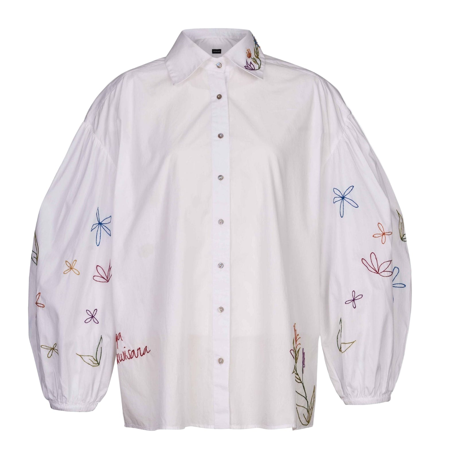 White shirt with colorful floral embroidery on a white background