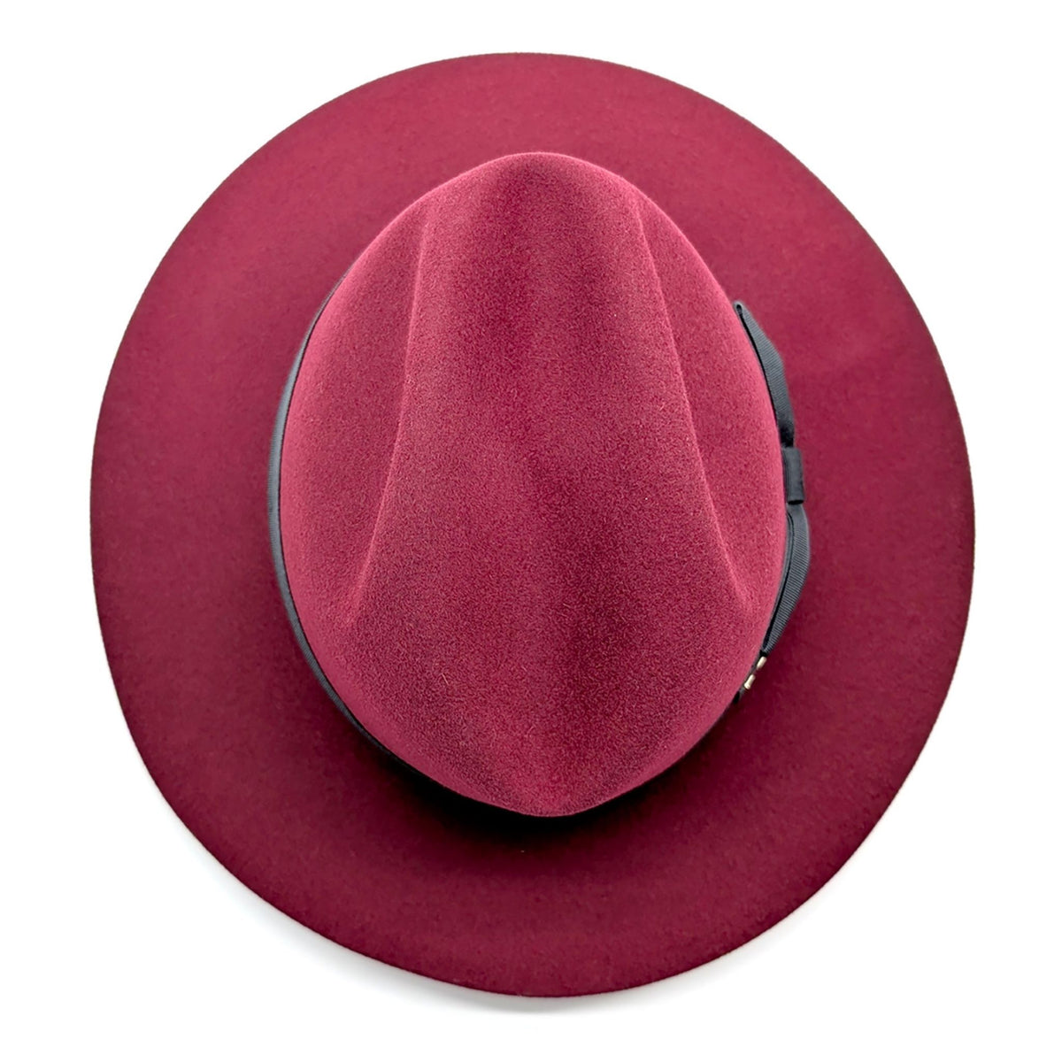 Red fedora hat on a white background
