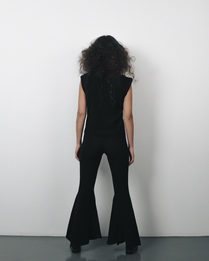 Model wearing Fluid Crepe Top by SAHAR JABERIAN