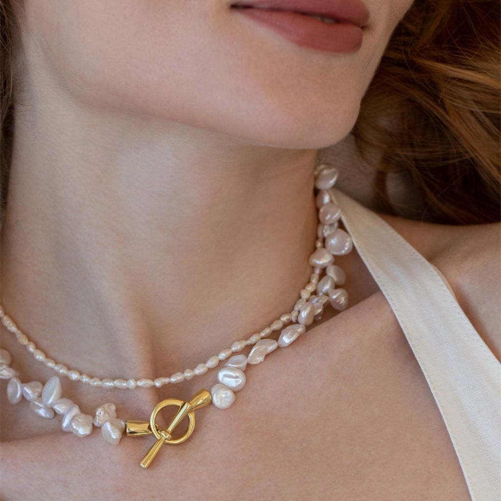 LINYA JEWELRY - Asymmetrical Pearl Necklace | Gold, buy at DOORS NYC