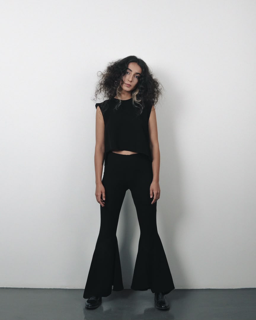 Model wearing Fluid Crepe Top by SAHAR JABERIAN