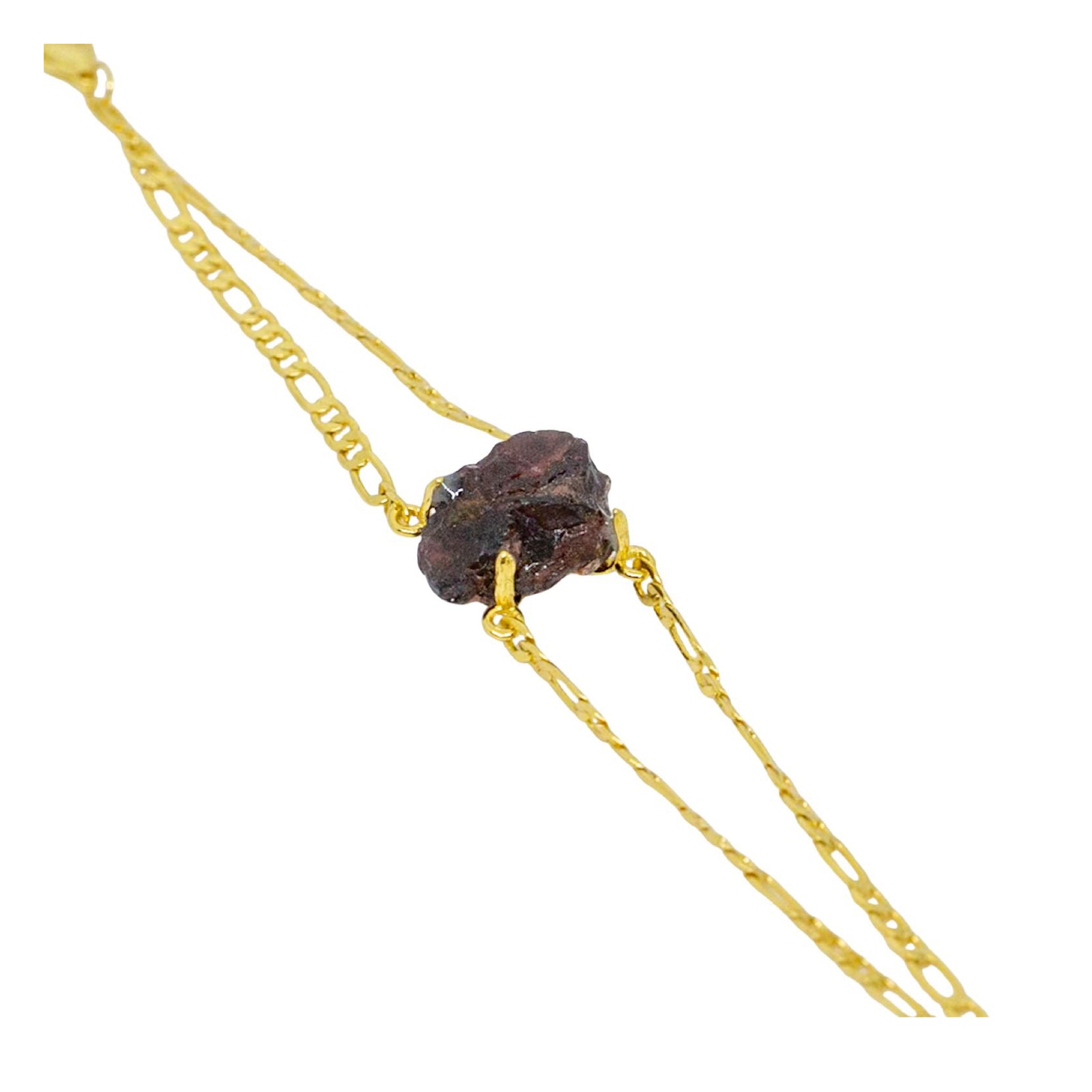 Gold chain with a dark brown stone on a white background