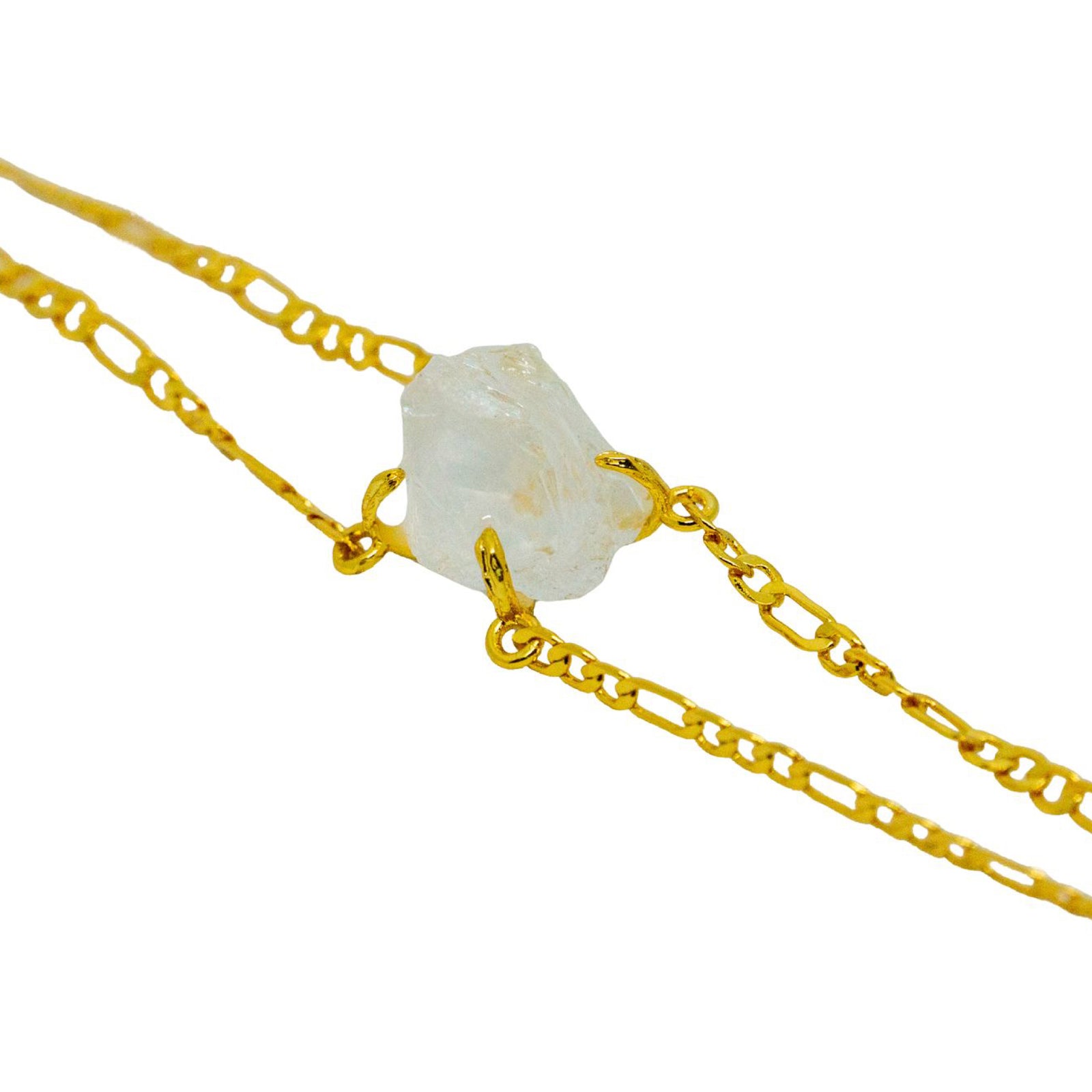 Gold chain with a white stone on a white background