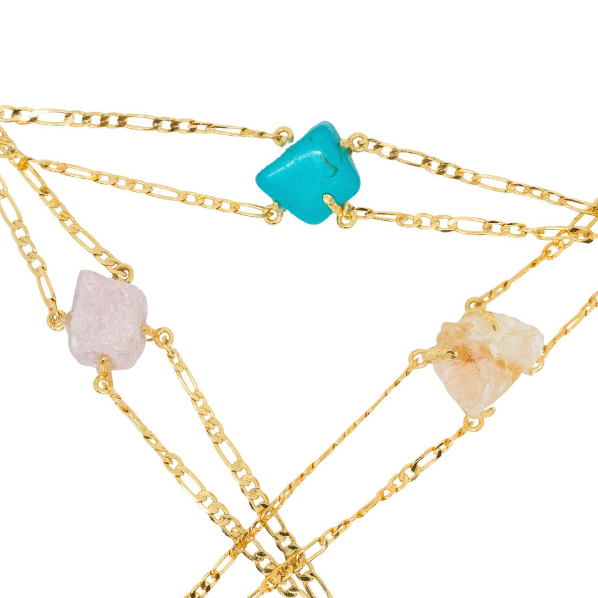 Gold chain necklaces with natural stone beads on a white background