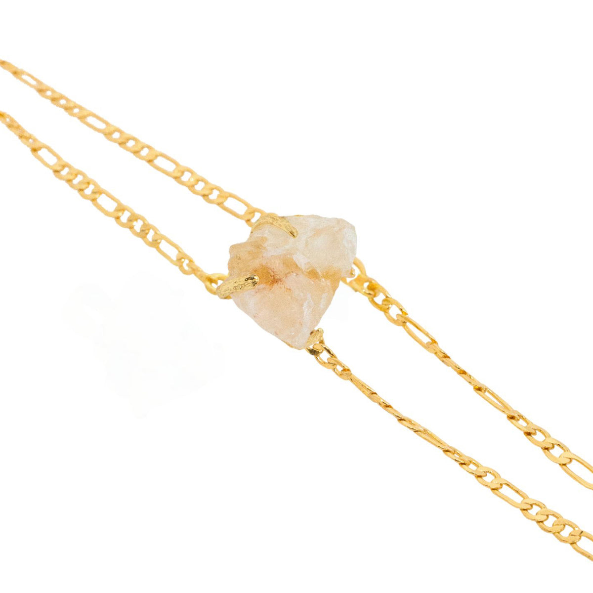 Gold chain necklace with a beige stone pendant on a white background