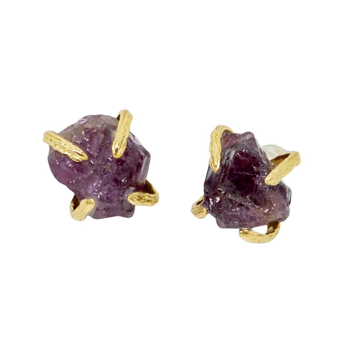 Pair of purple raw gemstone earrings with gold accents on a white background