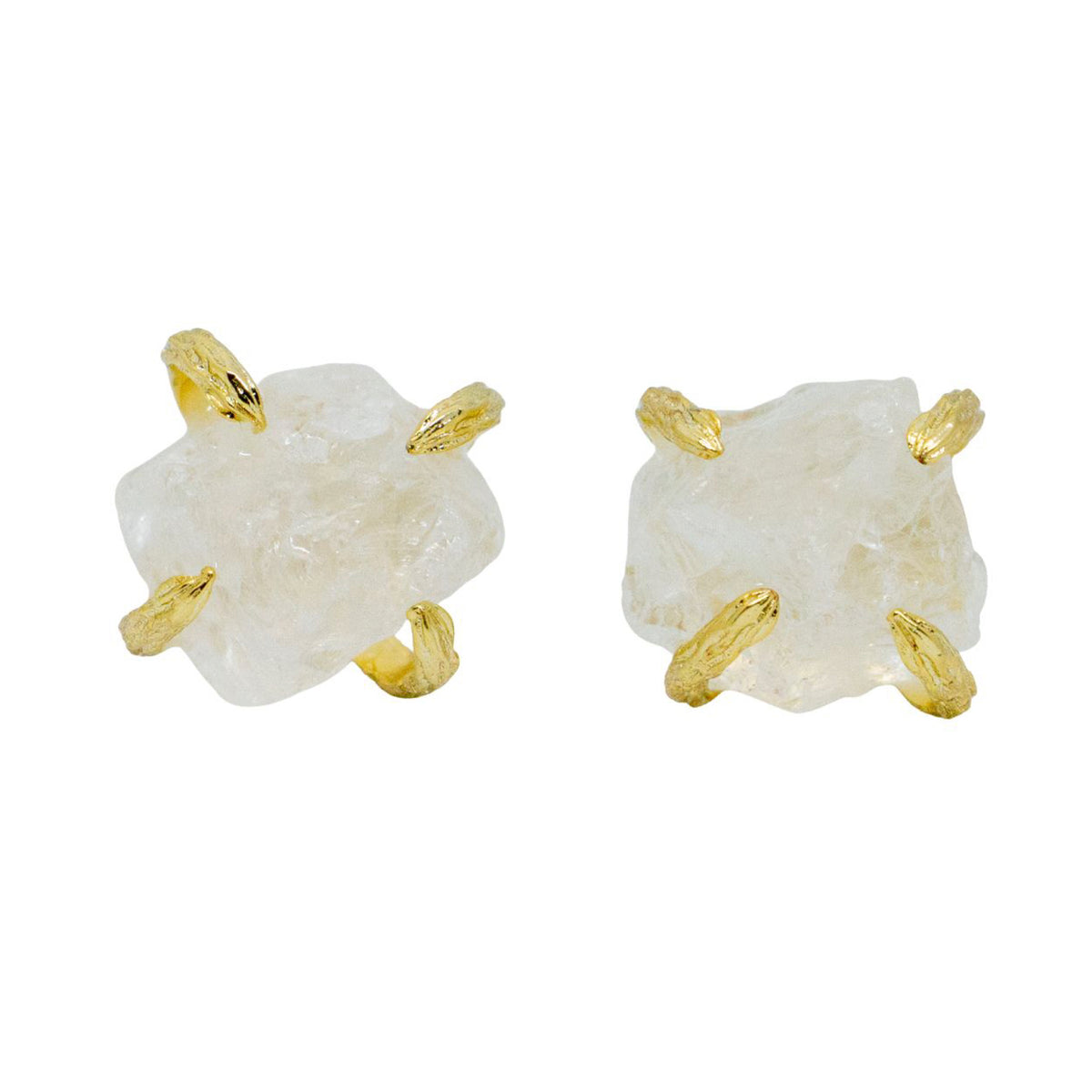 Pair of earrings with white stone and gold accents on a white background