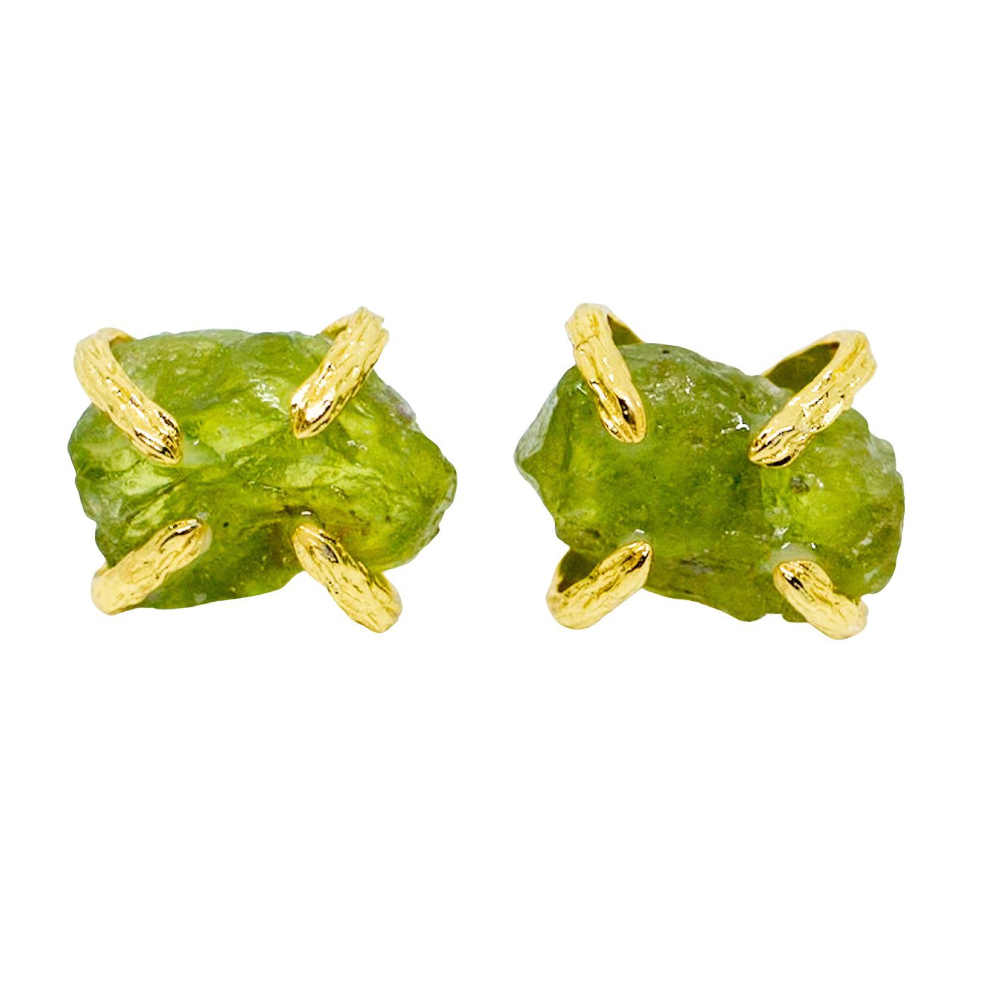 Pair of green stone earrings with gold accents on a white background