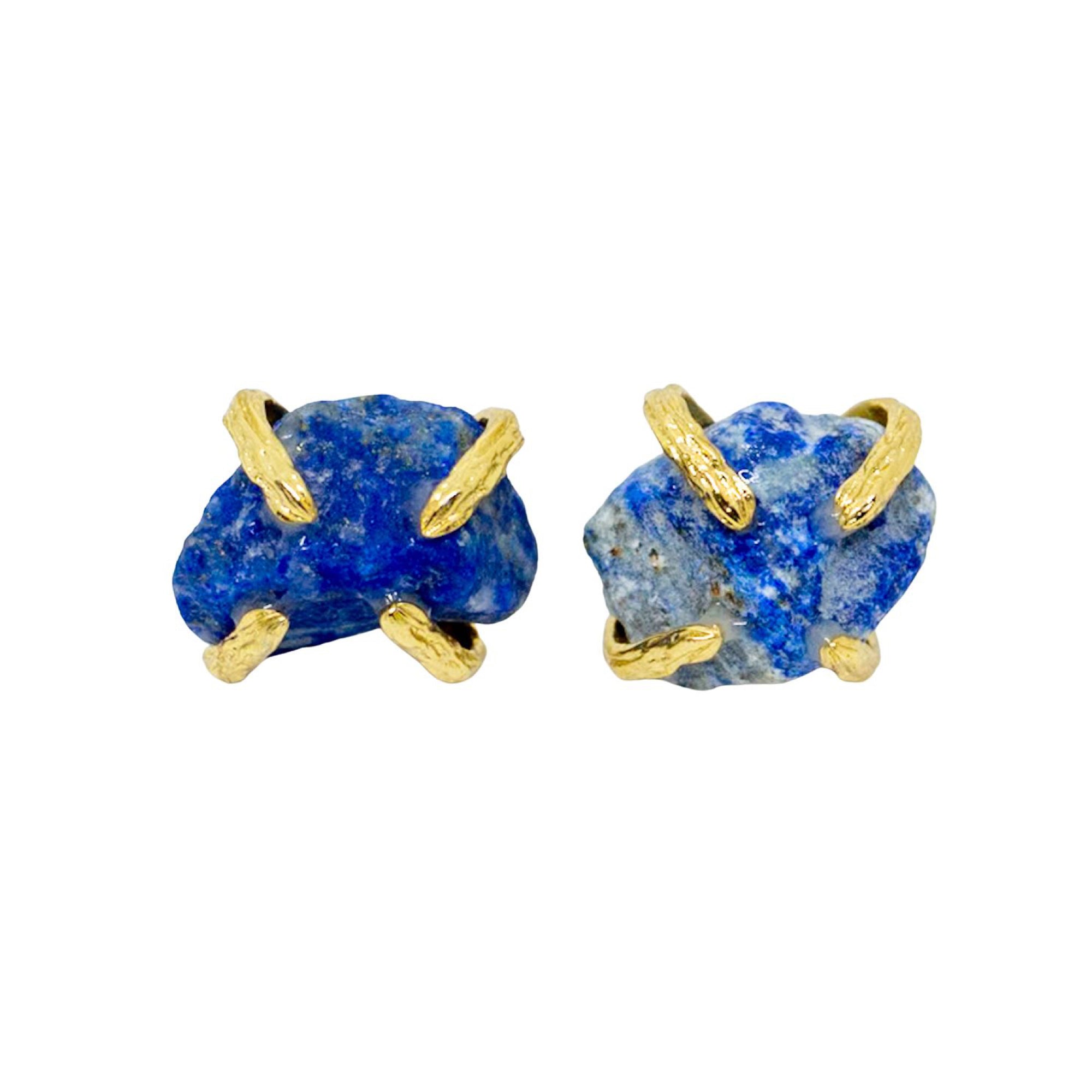 Pair of blue stone earrings with gold accents on a white background